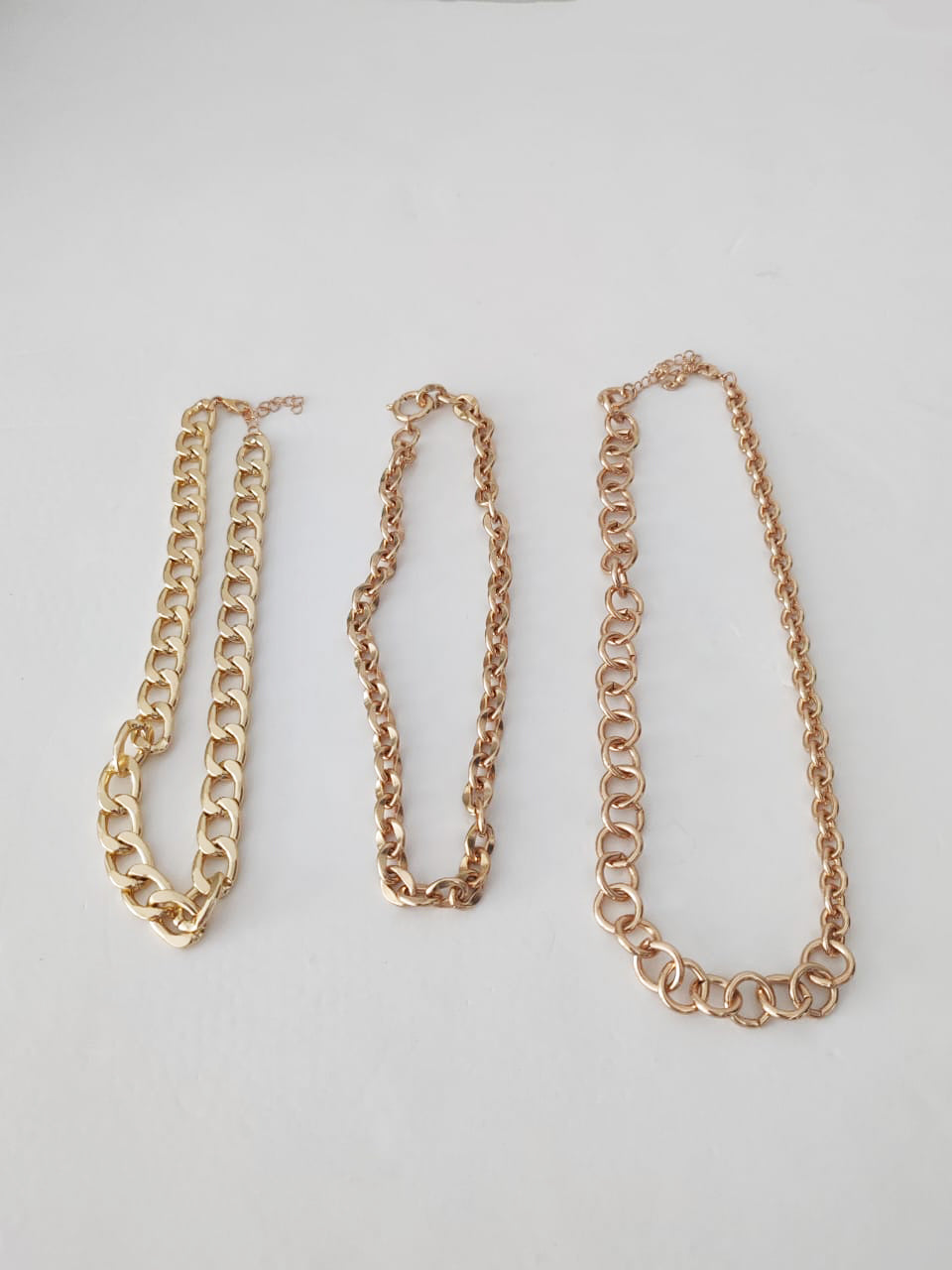 Layered gold chain necklaces