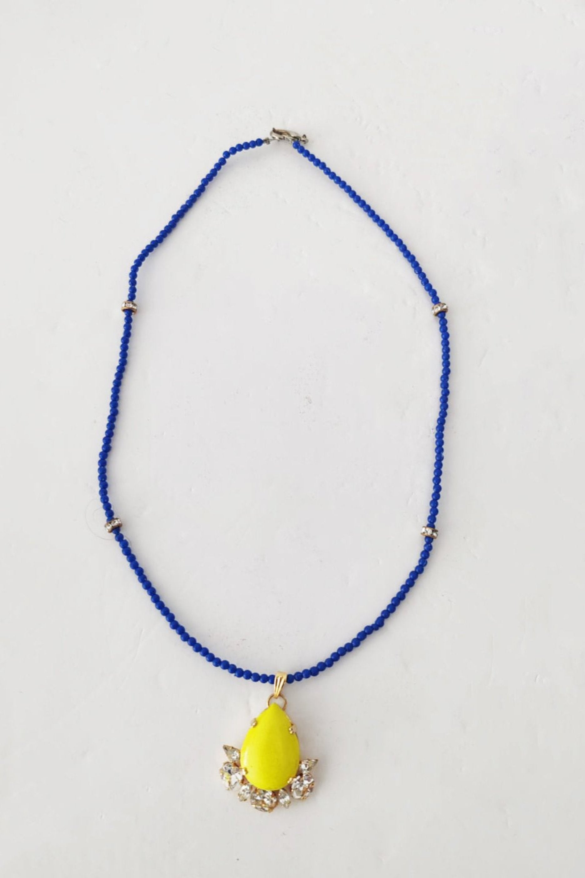 Blue Beaded Necklace with Yellow Pendant