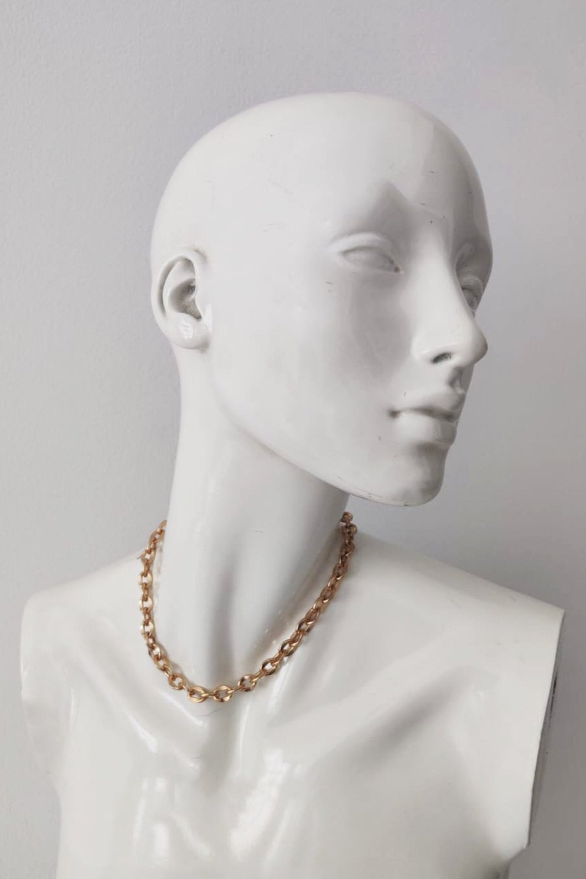 Layered gold chain necklaces