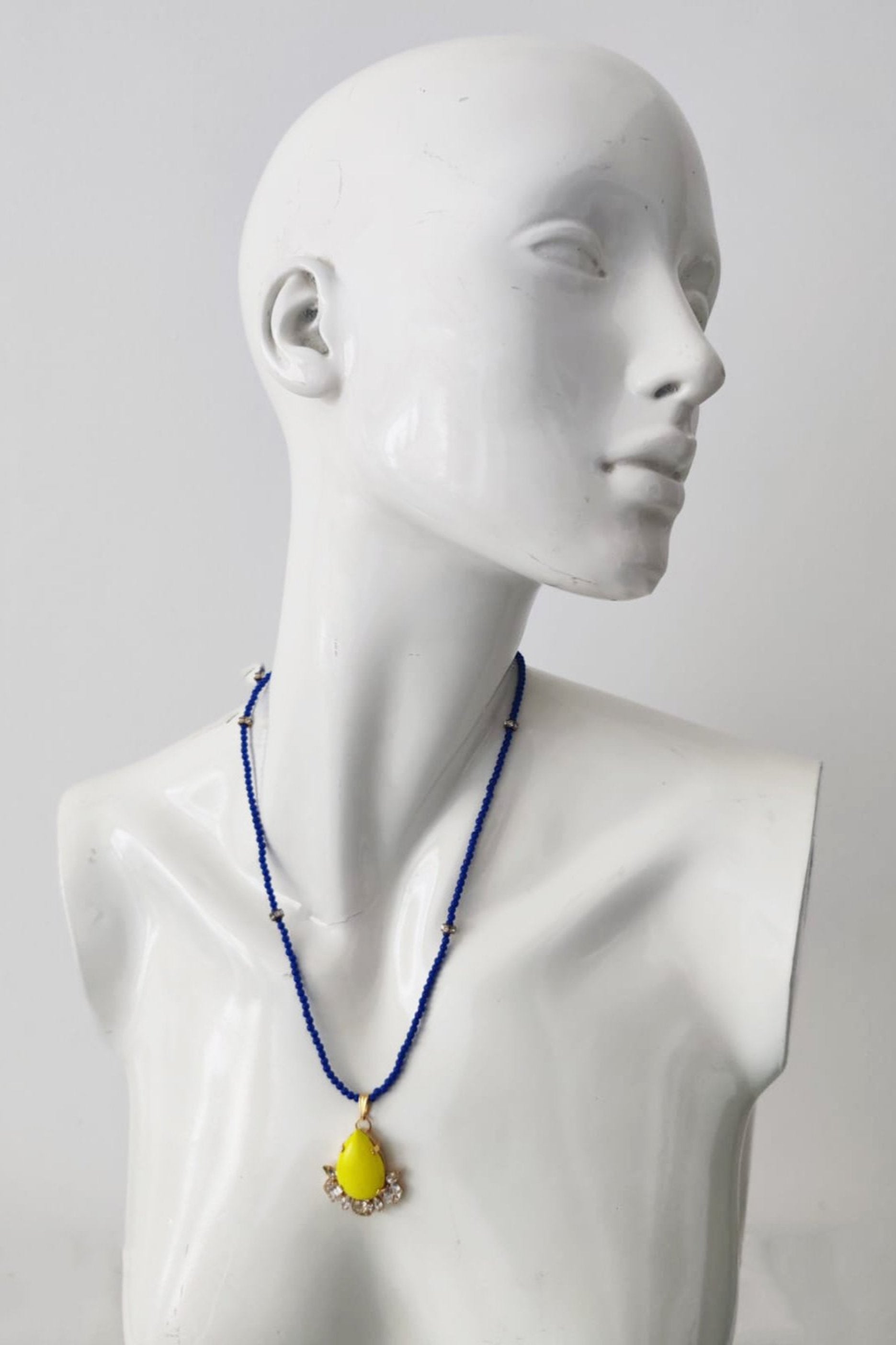 Blue Beaded Necklace with Yellow Pendant