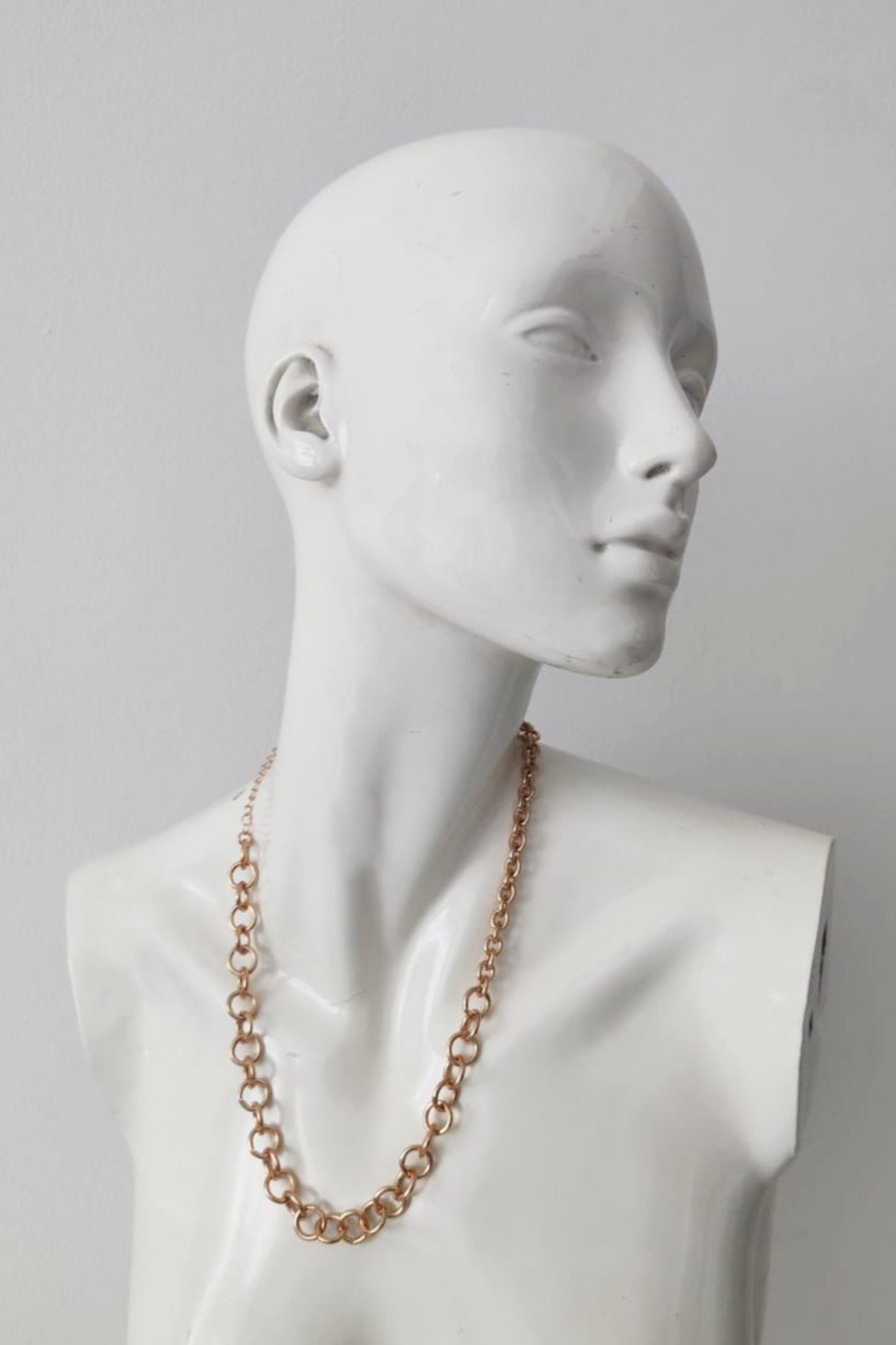 Layered gold chain necklaces