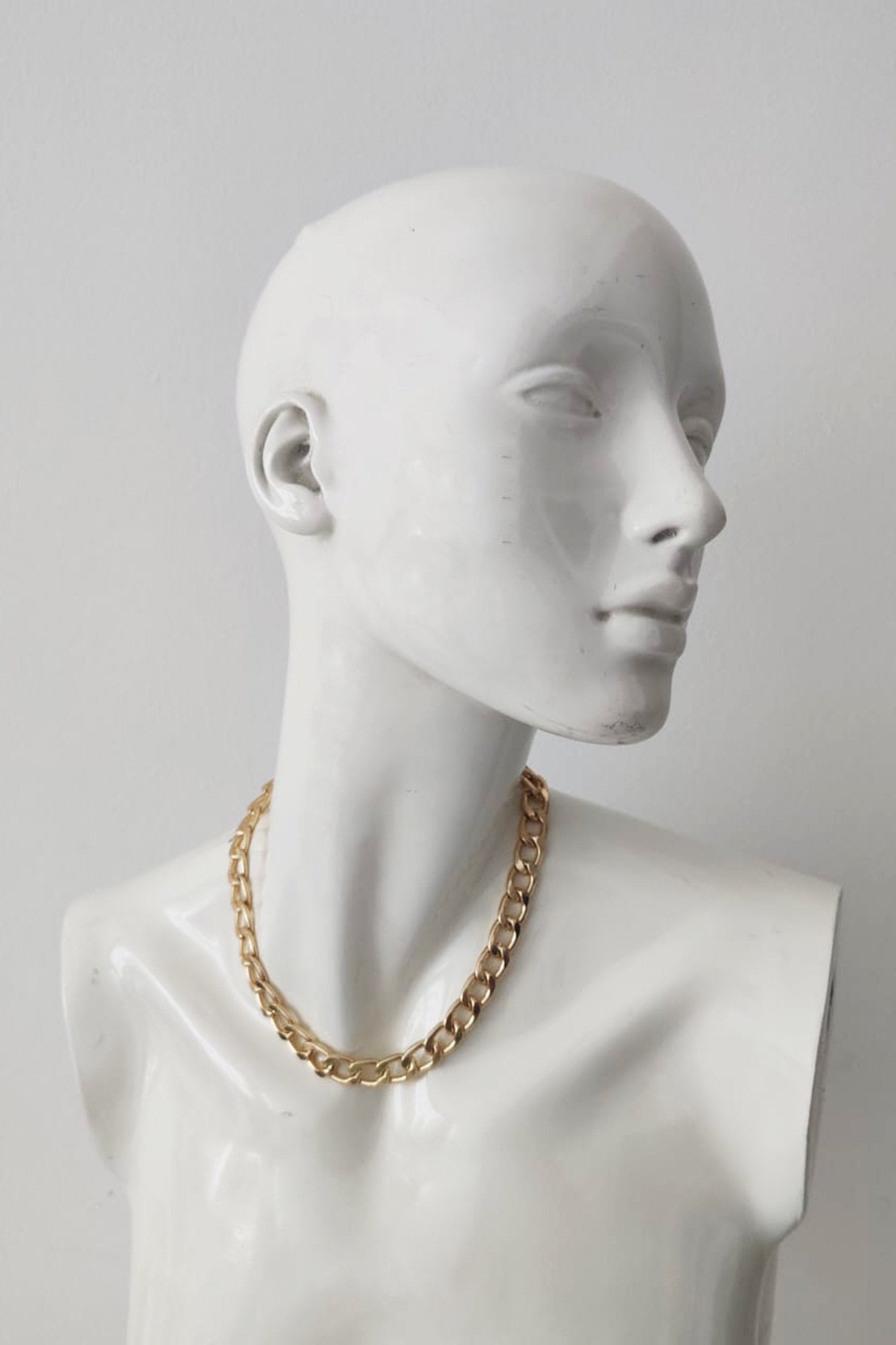 Layered gold chain necklaces