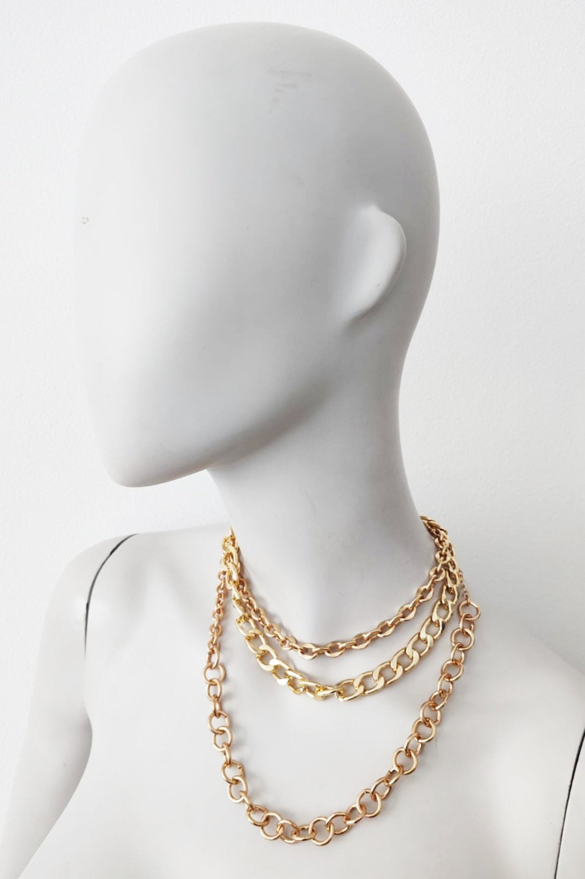 Layered gold chain necklaces